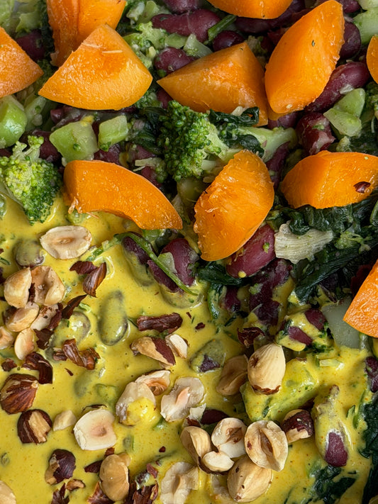 Broccoli Glow Bowl with Golden Tahini-Thyme Dressing & Roasted Hazelnuts