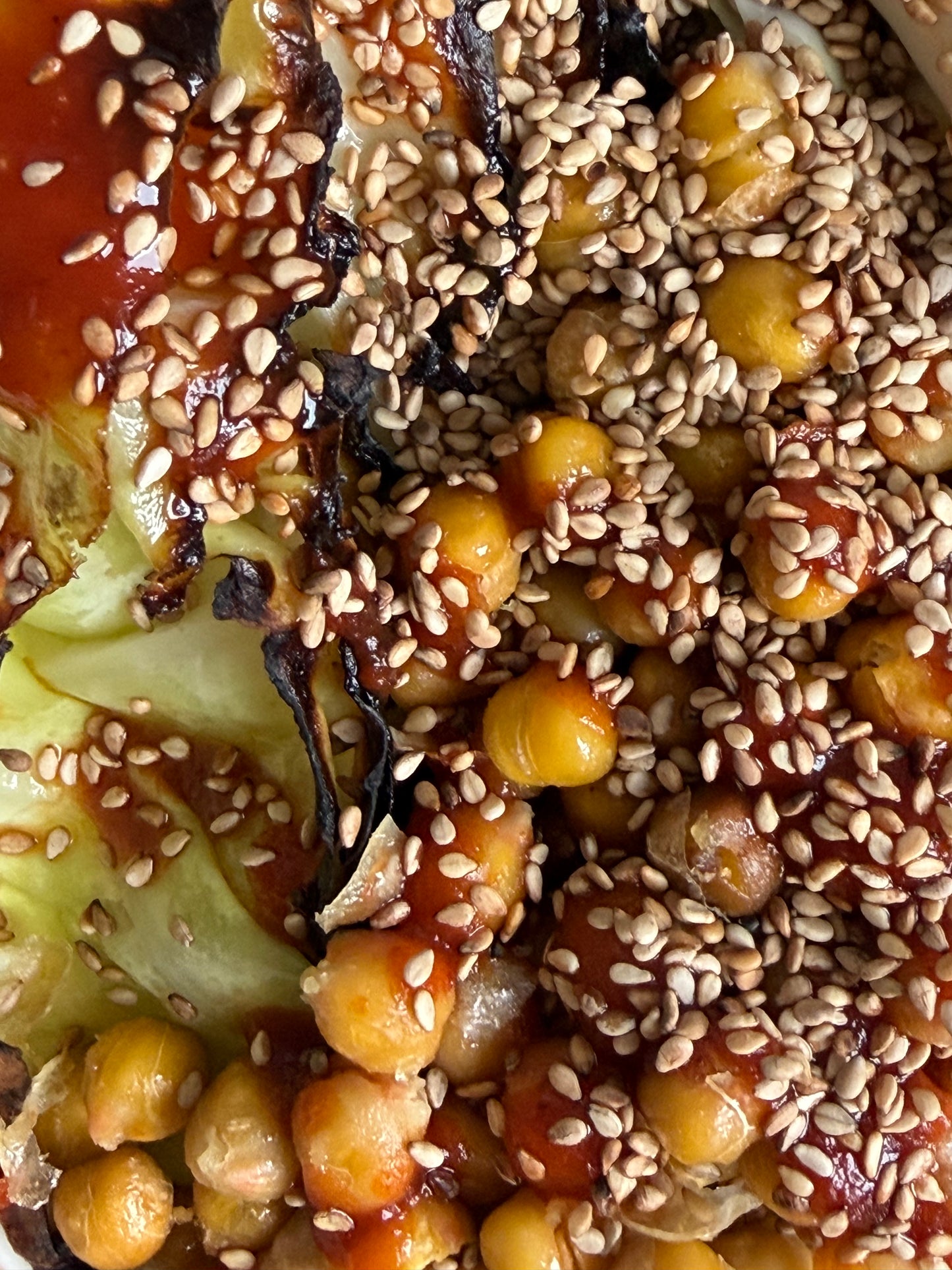 Charred Hispi Cabbage with Garlic Yogurt, Harissa & Crispy Chickpeas