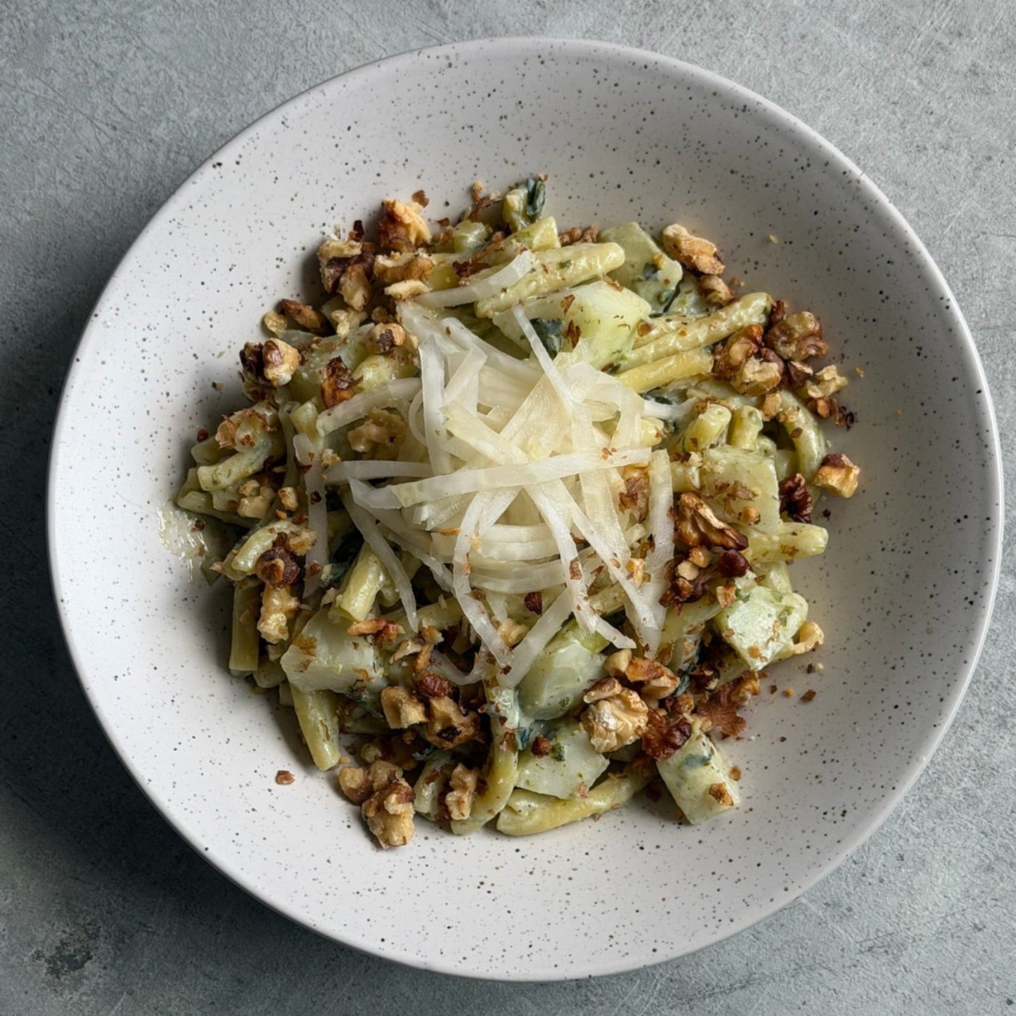 Casareccie with White Kohlrabi Sugo, Toasted Walnuts & Fresh Pickles