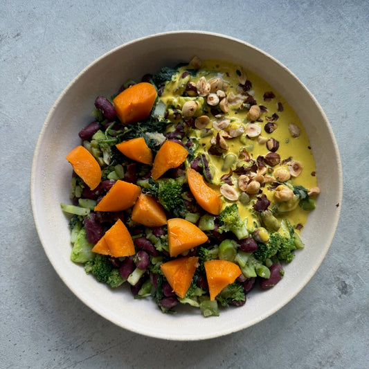 Broccoli Glow Bowl with Golden Tahini-Thyme Dressing & Roasted Hazelnuts