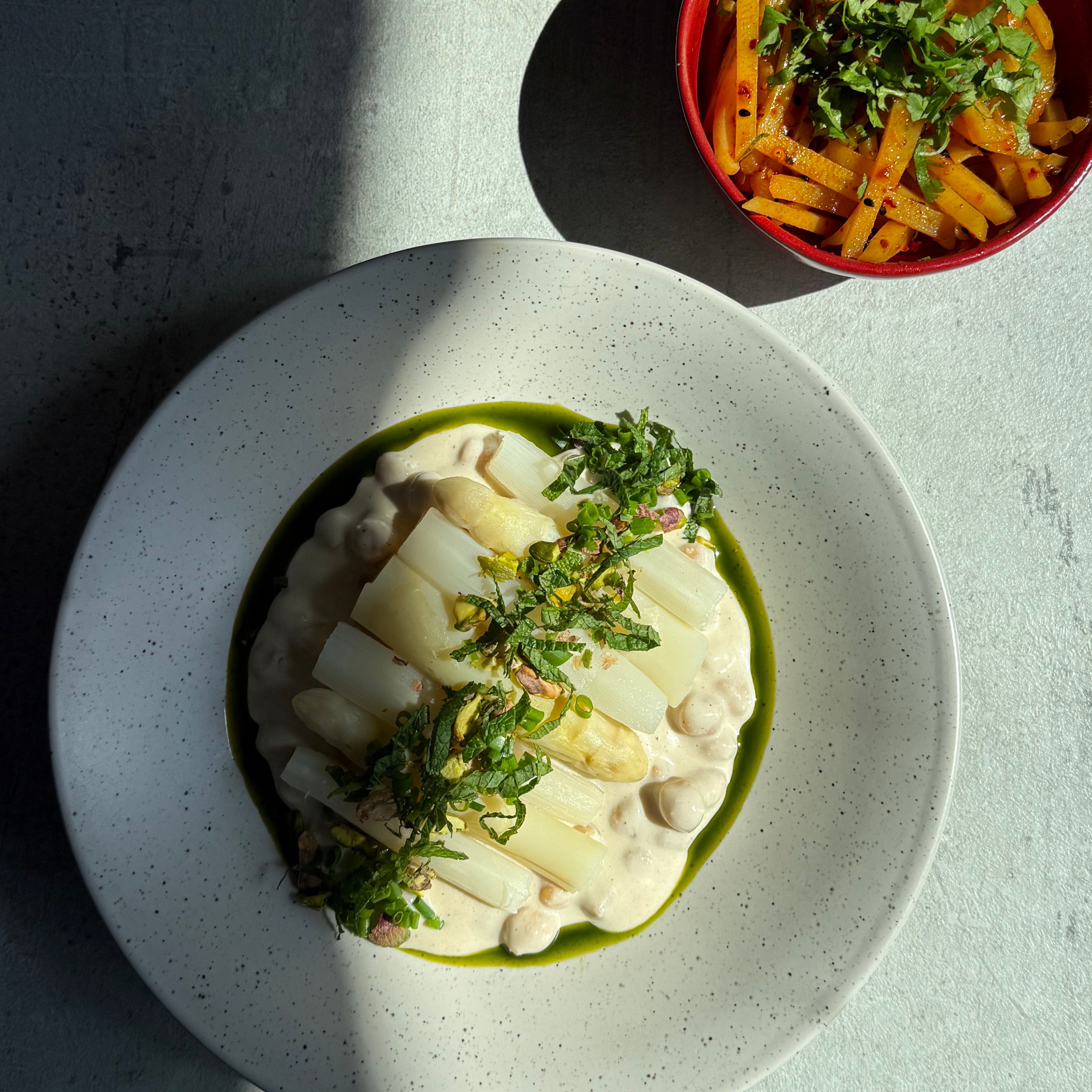 Image of White Asparagus & Chickpeas Umami Glow with Sichuan Potato Salad, Fresh Herbs & Pistachios