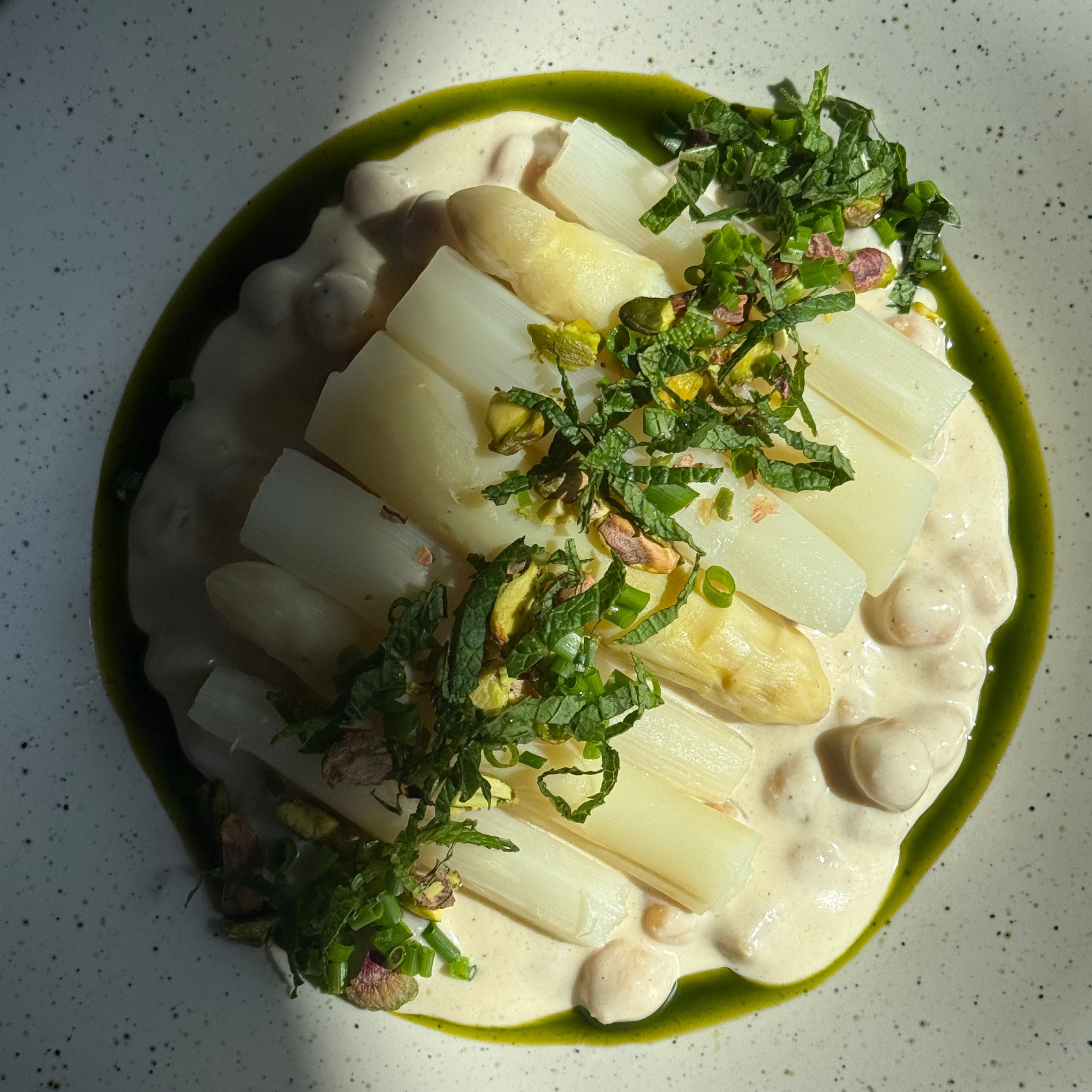 Image of White Asparagus & Chickpeas Umami Glow with Sichuan Potato Salad, Fresh Herbs & Pistachios