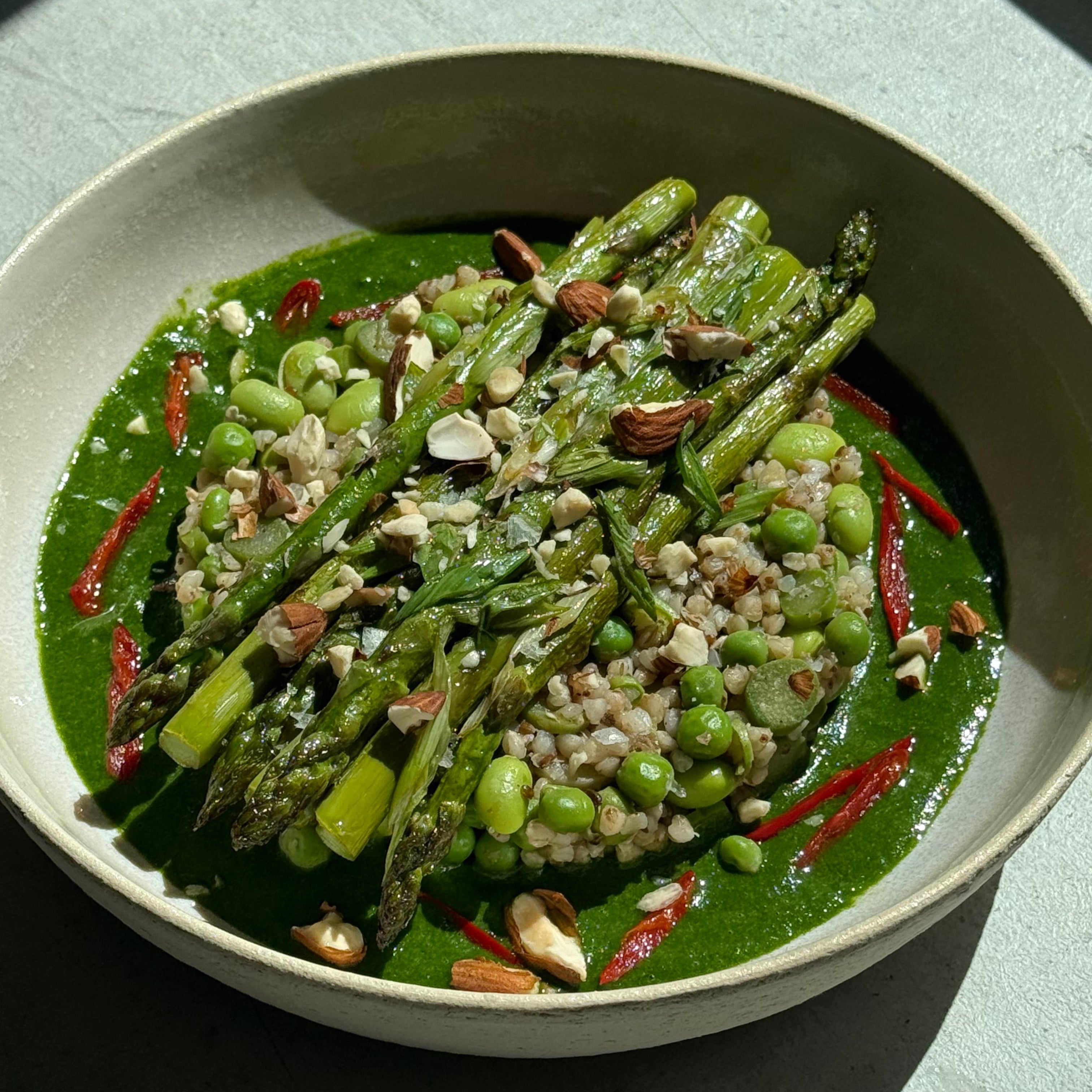 Image of Pan-Seared Green Asparagus & Buckwheat, Edamame, Peas Bowl with Wild Garlic & Fresh Herbs Pesto